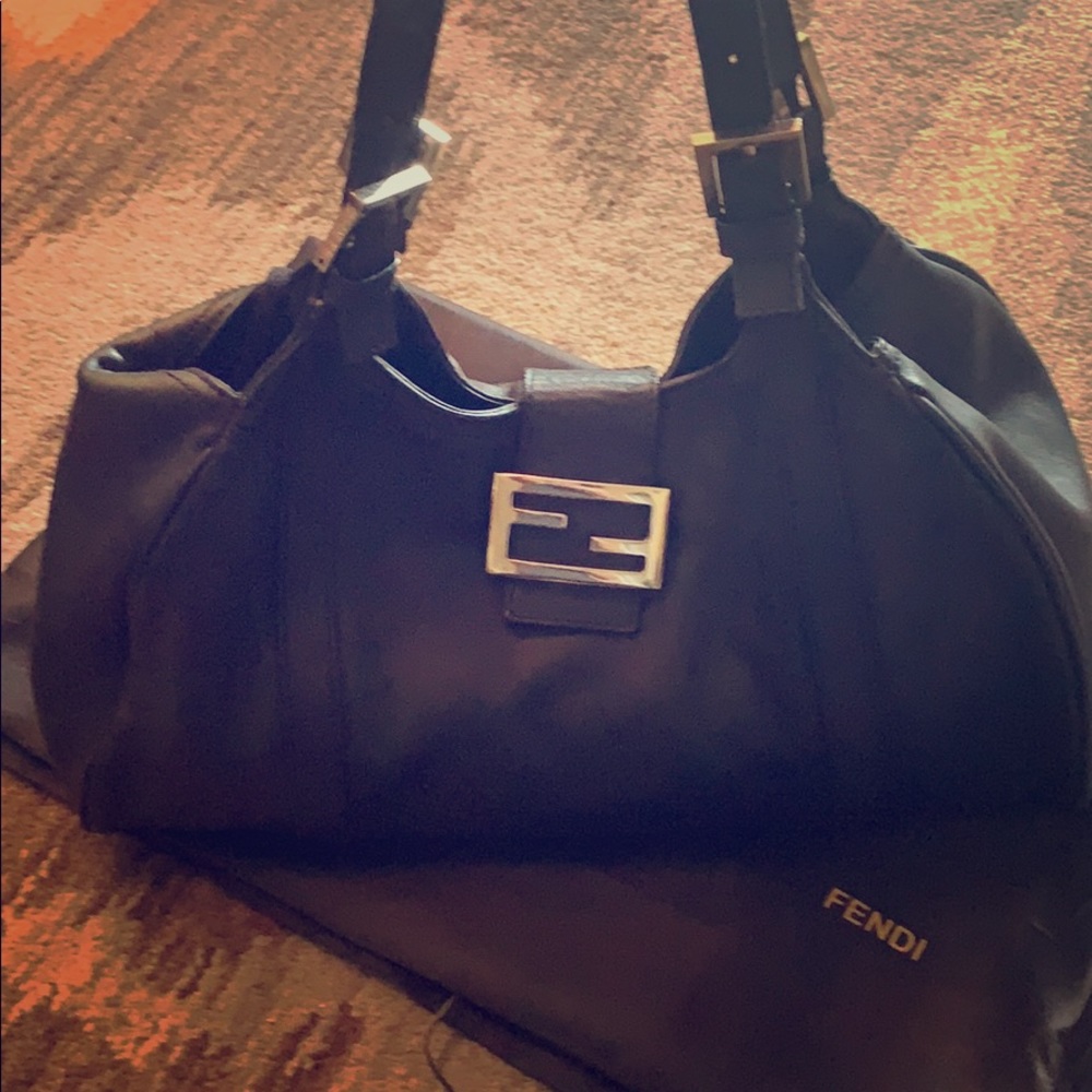 Authentic Fendi handbag bk leather, buckle closure